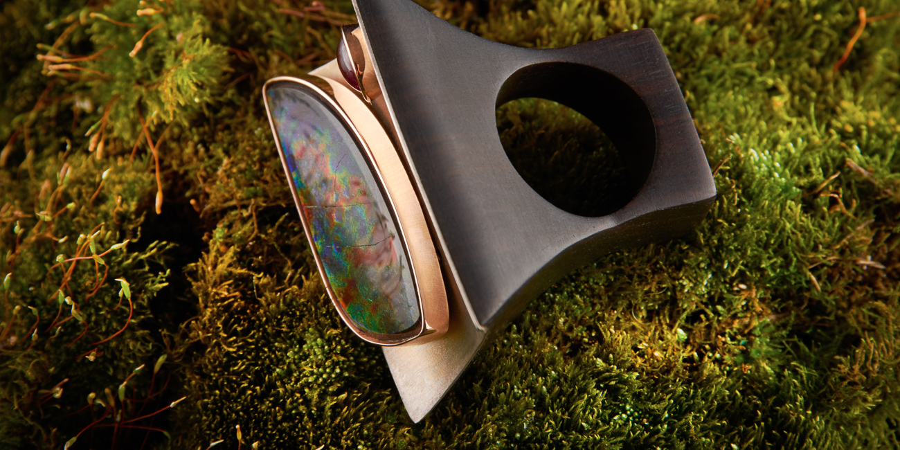 Ebony ring with silver leaf with almond and cabochon of rubellite gold plated.